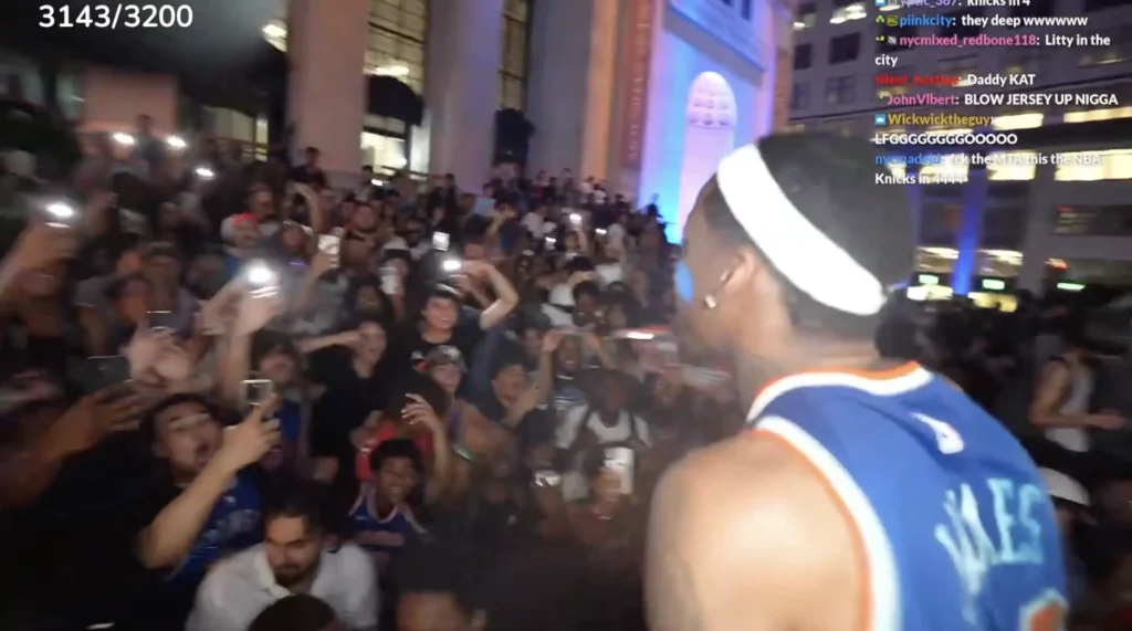 Crowd of fans film Tylil at Knicks watch party - Parasocial Magazine Crowd of fans film Tylil at Knicks watch party.