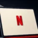 Illustration (device family): the Netflix mark in a constructed device scene