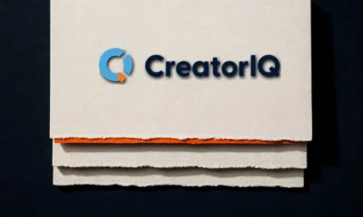 Illustration (object family): the CreatorIQ mark in a constructed object scene