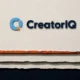 Illustration (object family): the CreatorIQ mark in a constructed object scene