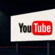 Illustration (signage family): the youtube mark in a constructed signage scene